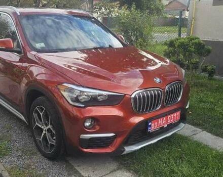 Оранжевый БМВ Х1, объемом двигателя 2 л и пробегом 65 тыс. км за 21600 $, фото 1 на Automoto.ua
