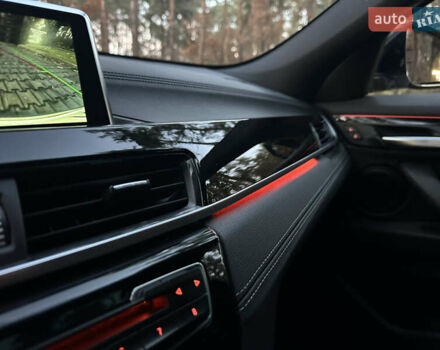 Белый БМВ X2, объемом двигателя 2 л и пробегом 128 тыс. км за 21700 $, фото 24 на Automoto.ua