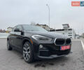 Черный БМВ X2, объемом двигателя 2 л и пробегом 130 тыс. км за 22000 $, фото 1 на Automoto.ua