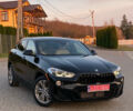 Черный БМВ X2, объемом двигателя 2 л и пробегом 135 тыс. км за 22499 $, фото 1 на Automoto.ua