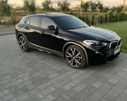 Черный БМВ X2, объемом двигателя 2 л и пробегом 115 тыс. км за 21900 $, фото 1 на Automoto.ua