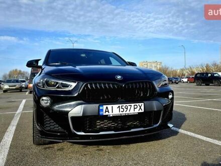 Черный БМВ X2, объемом двигателя 2 л и пробегом 102 тыс. км за 21900 $, фото 1 на Automoto.ua