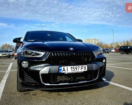Черный БМВ X2, объемом двигателя 2 л и пробегом 102 тыс. км за 21900 $, фото 1 на Automoto.ua