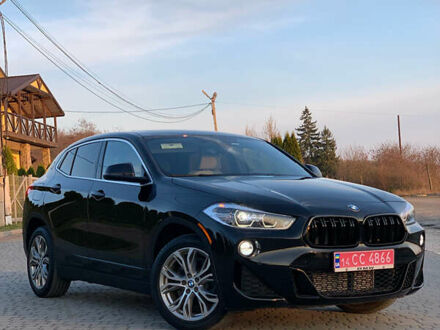 Черный БМВ X2, объемом двигателя 2 л и пробегом 135 тыс. км за 22499 $, фото 1 на Automoto.ua