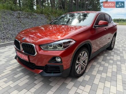 Красный БМВ X2, объемом двигателя 2 л и пробегом 207 тыс. км за 17900 $, фото 1 на Automoto.ua