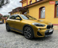Желтый БМВ X2, объемом двигателя 2 л и пробегом 96 тыс. км за 30800 $, фото 1 на Automoto.ua