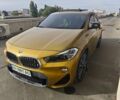 Желтый БМВ X2, объемом двигателя 2 л и пробегом 132 тыс. км за 16500 $, фото 1 на Automoto.ua