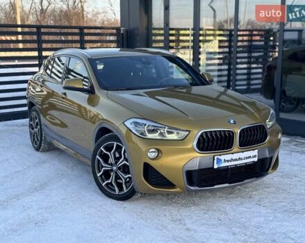Желтый БМВ X2, объемом двигателя 2 л и пробегом 97 тыс. км за 27900 $, фото 1 на Automoto.ua
