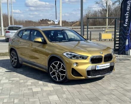 Желтый БМВ X2, объемом двигателя 2 л и пробегом 91 тыс. км за 25500 $, фото 1 на Automoto.ua