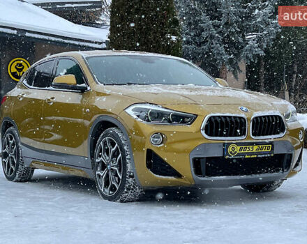 Желтый БМВ X2, объемом двигателя 2 л и пробегом 66 тыс. км за 29500 $, фото 1 на Automoto.ua