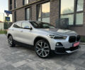 Серый БМВ X2, объемом двигателя 2 л и пробегом 123 тыс. км за 22500 $, фото 3 на Automoto.ua
