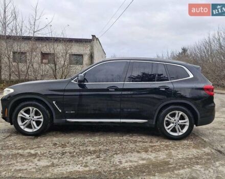 Черный БМВ Х3, объемом двигателя 2 л и пробегом 97 тыс. км за 18800 $, фото 1 на Automoto.ua