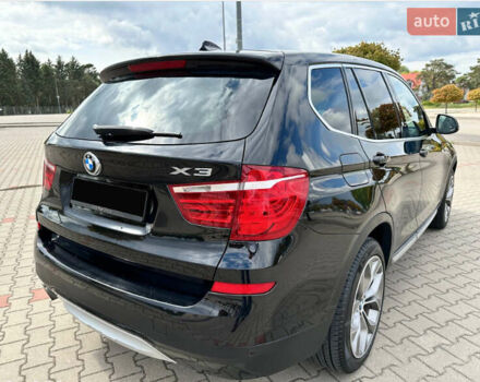 Чорний БМВ Х3, об'ємом двигуна 2 л та пробігом 72 тис. км за 20000 $, фото 4 на Automoto.ua
