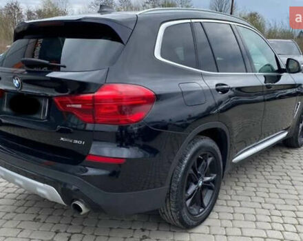 Черный БМВ Х3, объемом двигателя 2 л и пробегом 157 тыс. км за 26999 $, фото 4 на Automoto.ua