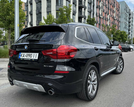 Чорний БМВ Х3, об'ємом двигуна 2 л та пробігом 110 тис. км за 31000 $, фото 3 на Automoto.ua