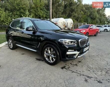 Чорний БМВ Х3, об'ємом двигуна 2 л та пробігом 56 тис. км за 36100 $, фото 1 на Automoto.ua