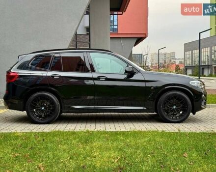 Чорний БМВ Х3, об'ємом двигуна 2 л та пробігом 112 тис. км за 28000 $, фото 3 на Automoto.ua
