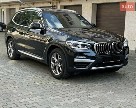 Чорний БМВ Х3, об'ємом двигуна 2 л та пробігом 75 тис. км за 27000 $, фото 2 на Automoto.ua