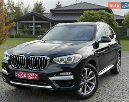 Чорний БМВ Х3, об'ємом двигуна 2 л та пробігом 121 тис. км за 27700 $, фото 1 на Automoto.ua