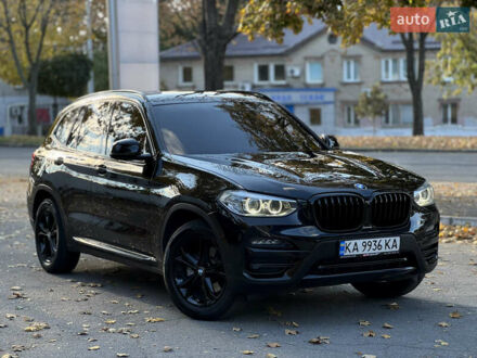 Черный БМВ Х3, объемом двигателя 2 л и пробегом 65 тыс. км за 28999 $, фото 1 на Automoto.ua