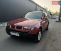 Красный БМВ Х3, объемом двигателя 2.5 л и пробегом 246 тыс. км за 7999 $, фото 1 на Automoto.ua
