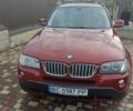 Красный БМВ Х3, объемом двигателя 3 л и пробегом 220 тыс. км за 12000 $, фото 1 на Automoto.ua