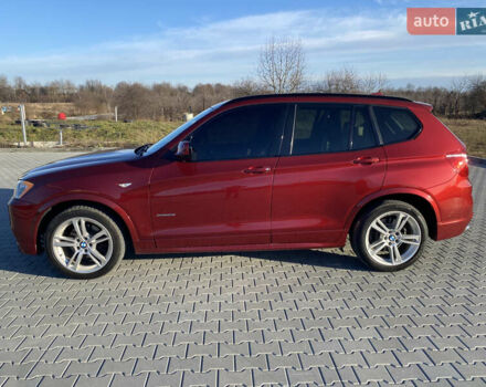 Красный БМВ Х3, объемом двигателя 2 л и пробегом 265 тыс. км за 13600 $, фото 4 на Automoto.ua