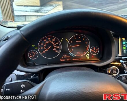 Красный БМВ Х3, объемом двигателя 2 л и пробегом 150 тыс. км за 19500 $, фото 4 на Automoto.ua