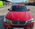 Красный БМВ Х3, объемом двигателя 2 л и пробегом 51 тыс. км за 23000 $, фото 1 на Automoto.ua