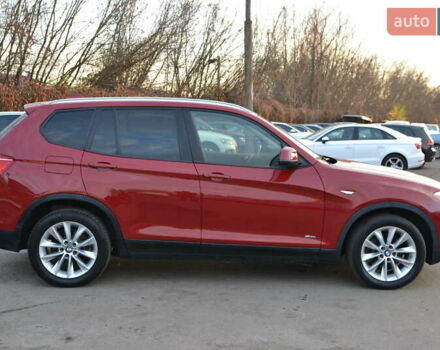 Красный БМВ Х3, объемом двигателя 2 л и пробегом 157 тыс. км за 13450 $, фото 5 на Automoto.ua