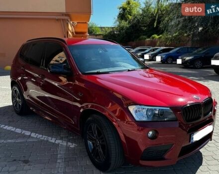 Красный БМВ Х3, объемом двигателя 2 л и пробегом 284 тыс. км за 14498 $, фото 1 на Automoto.ua