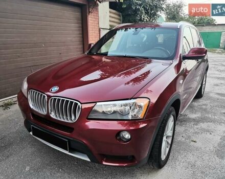 Красный БМВ Х3, объемом двигателя 2 л и пробегом 225 тыс. км за 15000 $, фото 1 на Automoto.ua