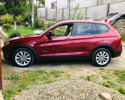 Красный БМВ Х3, объемом двигателя 2 л и пробегом 225 тыс. км за 12500 $, фото 1 на Automoto.ua