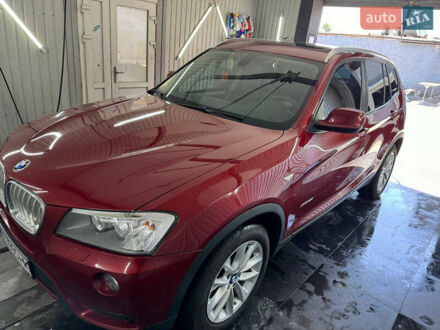 Червоний БМВ Х3, об'ємом двигуна 2 л та пробігом 130 тис. км за 17499 $, фото 1 на Automoto.ua