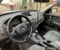 Серый БМВ Х3, объемом двигателя 2.5 л и пробегом 231 тыс. км за 10000 $, фото 3 на Automoto.ua