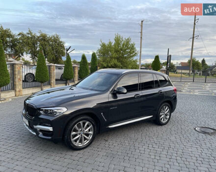 Серый БМВ Х3, объемом двигателя 2 л и пробегом 75 тыс. км за 29500 $, фото 1 на Automoto.ua