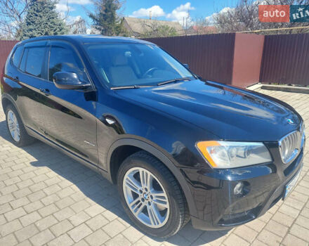 Синій БМВ Х3, об'ємом двигуна 2 л та пробігом 65 тис. км за 16599 $, фото 2 на Automoto.ua