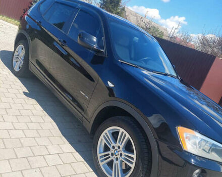 Синій БМВ Х3, об'ємом двигуна 2 л та пробігом 65 тис. км за 16599 $, фото 4 на Automoto.ua