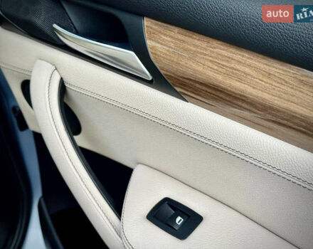 Синій БМВ Х3, об'ємом двигуна 2 л та пробігом 97 тис. км за 13900 $, фото 25 на Automoto.ua