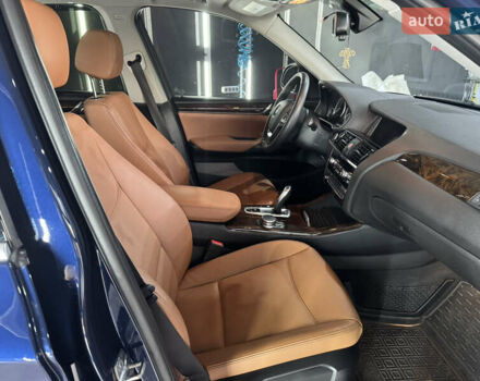 Синий БМВ Х3, объемом двигателя 2 л и пробегом 96 тыс. км за 20900 $, фото 5 на Automoto.ua