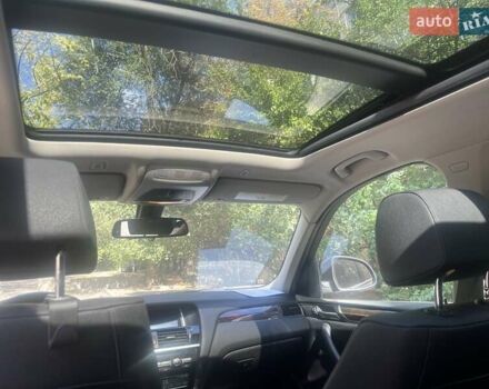 Синій БМВ Х3, об'ємом двигуна 2 л та пробігом 102 тис. км за 17800 $, фото 3 на Automoto.ua