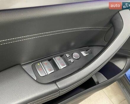 Синій БМВ Х3, об'ємом двигуна 2 л та пробігом 77 тис. км за 28990 $, фото 21 на Automoto.ua