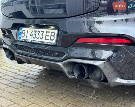 БМВ X4 M 2019 в Полтаве на Automoto.ua Черный БМВ X4 M, объемом двигателя 2.99 л и пробегом 99 тыс. км за 68500 $, фото 12 на Automoto.ua