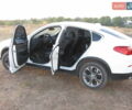 Белый БМВ Х4, объемом двигателя 2 л и пробегом 108 тыс. км за 30000 $, фото 6 на Automoto.ua