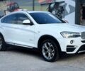 Белый БМВ Х4, объемом двигателя 2 л и пробегом 145 тыс. км за 22900 $, фото 1 на Automoto.ua