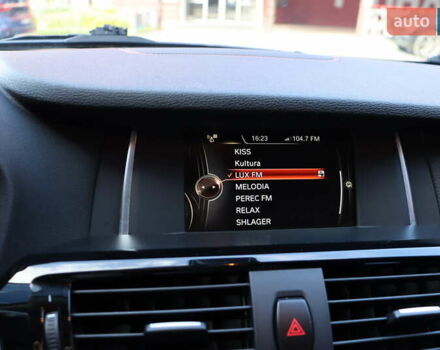 БМВ Х4 2015 в Львове на Automoto.ua Белый БМВ Х4, объемом двигателя 2 л и пробегом 245 тыс. км за 21900 $, фото 29 на Automoto.ua