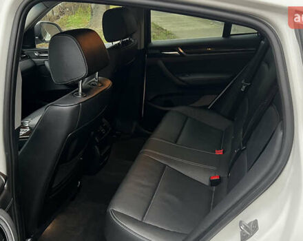 Белый БМВ Х4, объемом двигателя 2 л и пробегом 159 тыс. км за 19400 $, фото 13 на Automoto.ua