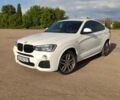 Белый БМВ Х4, объемом двигателя 2 л и пробегом 178 тыс. км за 28400 $, фото 1 на Automoto.ua