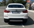 Белый БМВ Х4, объемом двигателя 2 л и пробегом 177 тыс. км за 22500 $, фото 4 на Automoto.ua