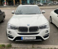 Белый БМВ Х4, объемом двигателя 2 л и пробегом 142 тыс. км за 24900 $, фото 1 на Automoto.ua
